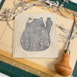 Lucky cat linocut print – hand-printed wall art by Grace Wong