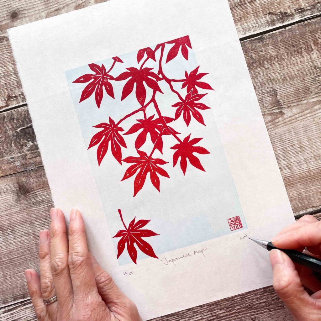 Gace Wong Artist making a card