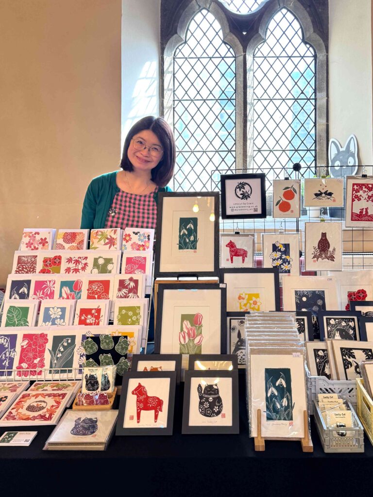 Gace Wong Linocut Print Artist At Market Stall